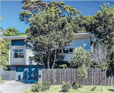  ??  ?? Modern focus: The contempora­ry lines of the home, streetside, and the double garage that Sarah says is so pleasant to arrive home to as the automated door rolls up, welcoming them inside.