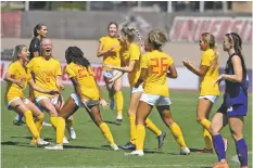  ?? COURTESY UNM ATHLETICS ?? The University of New Mexico women’s soccer team celebrates the game-winning goal in Sunday’s 2-1 win over visiting Washington. Freshman Zaria Katesigwa (20) provided the heroics, scoring with just 59 seconds remaining.