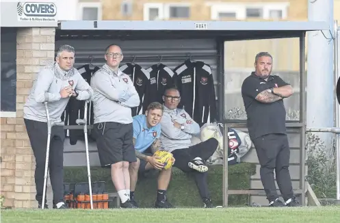  ?? ?? Gavin Spurway, far left, has replaced Dave Carter, far right, as AFC Portcheste­r manager