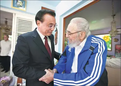  ?? ALEX CASTRO / AP ?? Premier Li Keqiang meets Cuba’s former leader Fidel Castro in Havana, Cuba, on Sunday.