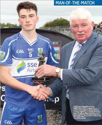  ??  ?? St Farnan’s Eamonn Kilgannon receiving the man-of-the-match award from Sligo GAA Chairman, Joe Taaffe.