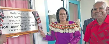  ?? Photo: Ashna Kumar ?? Minister for Health and Medical Services, Rosy Akbar unveils the plaque with Turaga Na Tui Kalabu, Ratu Paula Nawiriwiri, during the opening of the new Makoi Maternity Unit on February 16, 2018.