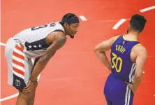  ?? Nick Wass / Associated Press ?? AllStar guard Bradley Beal (left) has averaged 30plus points each of the past two seasons. In the coming days he must decide whether to stay with the Wizards or request a trade.