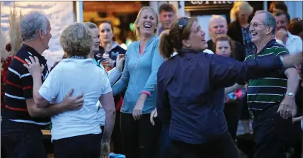  ?? Pic: Valerie O’Sullivan ?? Down to Kate Kearney’s to complete the set after walkers trekked up Strickeen to perform a set dance with members of Kilgobnet Biddies, in aid of Killarney Water Rescue as part of Killarney Walking Festival’s Charity night.