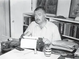  ?? JOHN F. KENNEDY PRESIDENTI­AL LIBRARY ?? Ernest Hemingway at his home in Cuba in the 1940s.