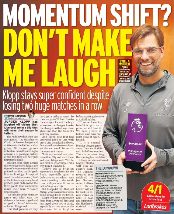  ??  ?? STILL A WINNER Klopp yesterday with the Manager of the Month award for December