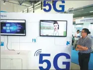  ?? A JING / FOR CHINA DAILY ?? The 5G promotion booth of ZTE at an industy expo in Beijing.