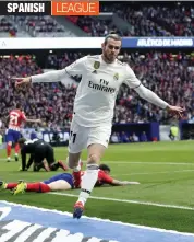  ?? — AP ?? Real Madrid’s Gareth Bale celebrates after scoring against Atletico Madrid in their La Liga match at the Metropolit­ano Stadium in Madrid on Saturday.