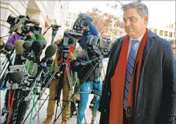  ?? Andrew Caballero-Reynolds AFP/Getty Images ?? CNN REPORTER Jim Acosta heads to court in Washington, D.C., to fight for access to the White House.