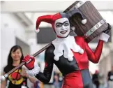  ??  ?? Alex Waldron plays the part of Harley Quinn from the movie Suicide Squad.