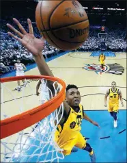  ?? AP ?? Utah Jazz guard Donovan Mitchell goes up to block a shot by the Oklahoma City Thunder during the second half of Game 2 of their first-round playoff series in Oklahoma City on Wednesday.