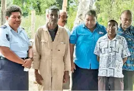  ??  ?? Members of the Sigatoka Community Policing and Crime Committee members deliver relief supplies to the family who lost their house to a fire at Kavanagasa­u, Nadroga.