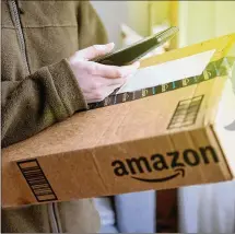  ?? DREAMSTIME / TNS ?? Amazon has developed a new delivery system, Amazon Key, available for Prime members, that unlocks the front door for package delivery and other trusted services. The camera and lock system start at $250.