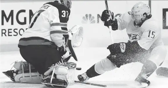  ?? MARK HUMPHREY/THE ASSOCIATED PRESS ?? Winnipeg goalie Connor Hellebuyck was a wall in net Friday, stopping Craig Smith and almost every other Nashville player in a 4-1 Jets victory.