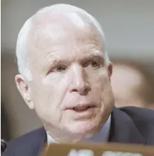  ?? AP PHOTOS; STAFF FILE PHOTO, LEFT, BY NANCY LANE ?? ALL IS WELL: Arizona U.S. Sen. John McCain, above, praised FBI Director James Comey as a ‘man of honor and integrity,’ while U.S. Sen. Edward J. Markey, left, said the firing ‘sets a deeply alarming precedent.’