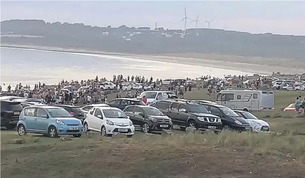  ??  ?? Crowds at Ogmore-by-Sea on June 25