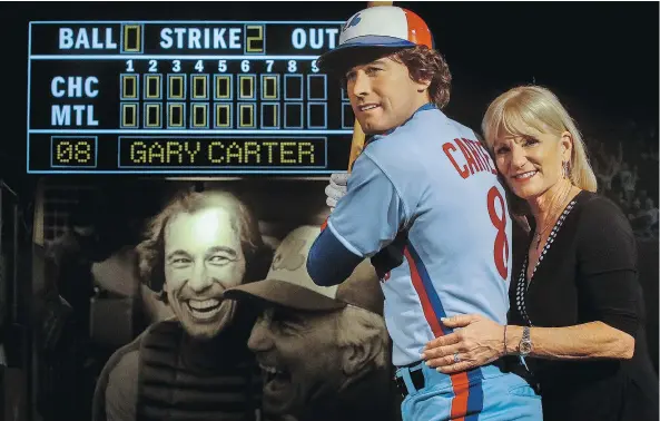  ?? — POSTMEDIA NEWS ?? Sandy Carter, wife of Expo great Gary Carter, thinks the wax statue of Carter at Grevin wax museum in Montreal is ‘fantastic.’