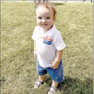  ??  ?? Fourteen-month-old Rylan Lemon enjoys the fresh air and sunshine at the Ozark Orchard Festival, his second time to see the sights at the community event. This year, Rylan enjoyed a hot dog, baked beans and some chicken.