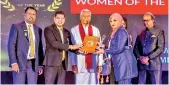  ?? ?? Kitchen & Bedroom Director Fathima Zuhara Rushmi receiving Young Business Women of the Year (Gold- Medium) at BWIO Awards 2020