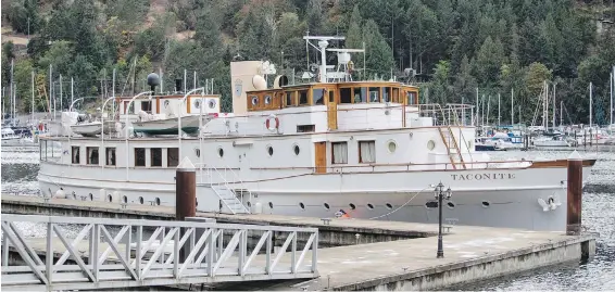  ??  ?? The Taconite sits moored in Maple Bay. The historic vessel will soon be on its way to a French buyer.