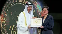 ?? File photo ?? Sheikh Mohamed bin Zayed Al Nahyan, Crown Prince of Abu Dhabi and Deputy Supreme Commander of the UAE Armed Forces, hands over a Lifetime Achievemen­t Award to a recepient during the opening of World Future Energy Summit in January. —