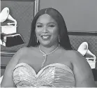  ?? JORDAN STRAUSS/ INVISION/ AP ?? Lizzo, seen at the Grammy Awards, called out the body positivity movement.