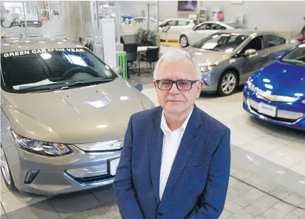  ?? JASON PAYNE/PNG ?? Dennis Rogoza, CEO of B.C. Scrap-It, says new all-electric vehicles that can travel more than 300 km on a single charge will lead to more consumers willing to trade in gas cars for battery ones.