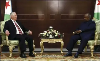  ??  ?? U.S. Secretary of State Rex Tillerson (left) meets with Djibouti’s President Ismail Omar Guelleh at the Presidenti­al Palace in Djibouti on Friday. Tillerson says a “dramatic” and surprising change of posture by North Korean leader Kim Jong Un led U.S....