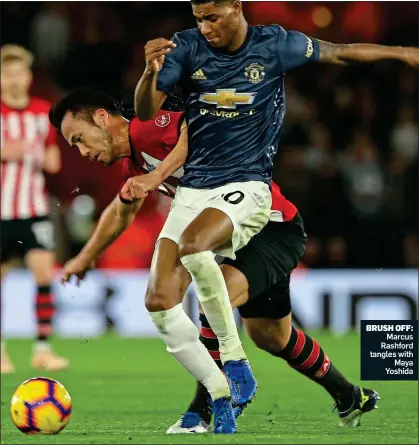  ??  ?? BRUSH OFF: Marcus Rashford tangles with Maya Yoshida