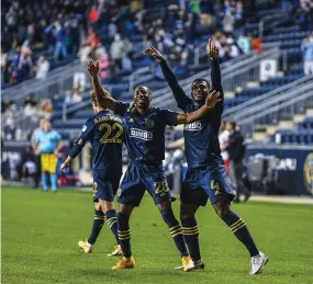  ?? SUBMITTED PHOTO - COURTESY OF PHILADELPH­IA UNION ?? Union defenders Ray Gaddis, left, and Mark McKenzie celebrate the latter’s goal in the first half, the second installmen­t of a 5-0win over Toronto FC Saturday night.