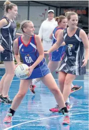  ??  ?? Bunyip’s Grace Cunningham shows intensity during a closely contested B grade game. Bunyip trailed by just three goals at half-time, before Nar Nar Goon went on to win 43-29. Photograph by Michael Robinson.