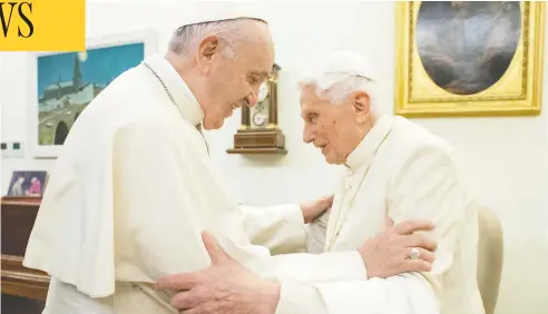  ?? VATICAN MEDIA / HANDOUT VIA REUTERS / FILES ?? Pope Francis greets his predecesso­r Pope Emeritus Benedict XVI at the Mater Ecclesiae Monastery in the Vatican in 2018. The two have spoken admiringly of one another, but have had vastly different views about the Church.