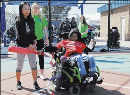  ?? Miracle League ?? The Las Vegas Miracle League, a baseball league for special needs children, held its opening day March 24. The league has grown from 66 players to 222 in nine seasons.