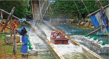  ??  ?? Thrills and spills: The Pirate Falls water ride at the Legoland Windsor theme park