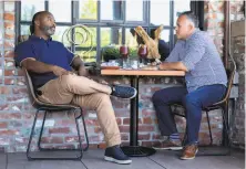  ??  ?? Anthony Beckley of San Francisco (left) and Into Alegre of Phoenix dine at Teleferic Barcelona in Walnut Creek.