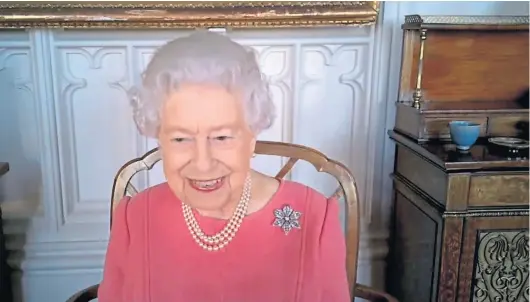  ??  ?? MEMORIES: The Queen tells the video meeting that the community feeling shown during lockdown reminded her of the wartime spirit.