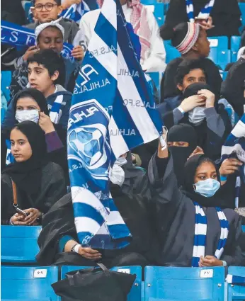  ?? Picture: AFP PHOTO ?? Saudi women enjoy a new-found freedom, watching a soccer match live. However the Gulf state’s human rights record is as deplorable as ever.