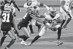  ?? GERRY BROOME/ASSOCIATED PRESS FILE PHOTO ?? Saints tight end Jared Cook runs as Panthers linebacker Shaq Thompson chases Sunday in Charlotte, N.C.