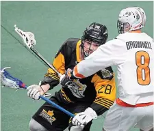  ?? BARRY GRAY THE HAMILTON SPECTATOR FILE PHOTO ?? The Rock’s Stephen Keogh, left, scored four times Saturday night after working the overnight shift as a Hamilton firefighte­r.