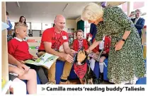  ?? ?? > Camilla meets ‘reading buddy’ Taliesin