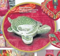  ??  ?? Floating tortoise, considered auspicious by many, is for ₹40 a pair