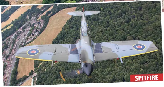  ??  ?? SPITFIRE A nation’s favourite: Britain’s beloved Spitfires were on display, this one with ‘clipped’ wing tips which increased speed at low level