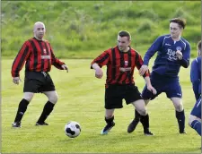  ??  ?? Ross McLoughlin action against Paddy Heraghty. Pic: Carl Brennan.