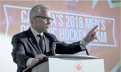  ?? JEFF MCINTOSH/ THE CANADIAN PRESS ?? Hockey Canada CEO Tom Renney announces Canada’s national men’s team roster for the upcoming Winter Olympics at a press conference Thursday in Calgary.