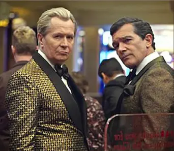  ?? Netflix ?? Gary Oldman, left, and Antonio Banderas, co-star as lawyers in “The Laundromat,” streaming on Netflix.