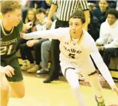  ?? DAVID GARRETT/SPECIAL TO THE MORNING CALL ?? Becahi’s Alex Cercado works toward the basket while being defended by Central Catholic’s Anthony Jones during Thursday’s game at Bethlehem Catholic.