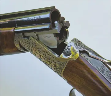  ??  ?? the Legend has monobloc barrels and Perazzi-like bolting to the rear. tastefully decorated with medium scrollwork in the Spanish style, cut by hand
the action body is