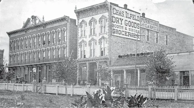  ?? COURTESY OF THE NM MUSEUM OF HISTORY ?? The Charles Ilfeld Store, shown in the late 1800s, was on the plaza in Las Vegas, N.M., next to the Plaza Hotel. It is now part of the hotel, and the store sign can be barely seen in a ghost image when the sun is just right. The Ilfelds were among many...