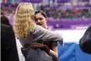  ??  ?? Evgenia Medvedeva reacts with coach Eteri Tutberidze after she was pipped for golf in the women’s free skate at the Pyeongchan­g Olympics. Photograph: Maddie Meyer/Getty Images