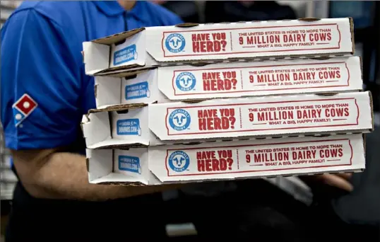  ?? Andrew Harrer ?? NWPA Pizza Inc., the operator of seven Domino’s locations in Erie, Crawford and Mercer counties, was fined by the Pennsylvan­ia Department of Labor and Industry after an investigat­ion uncovered 715 violations of the Child Labor Act.